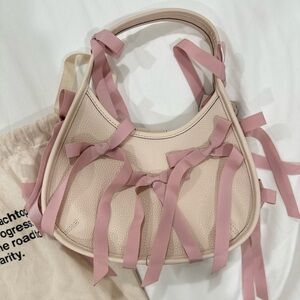 Ergo Bag In Coachtopia Leather With Allover Bows